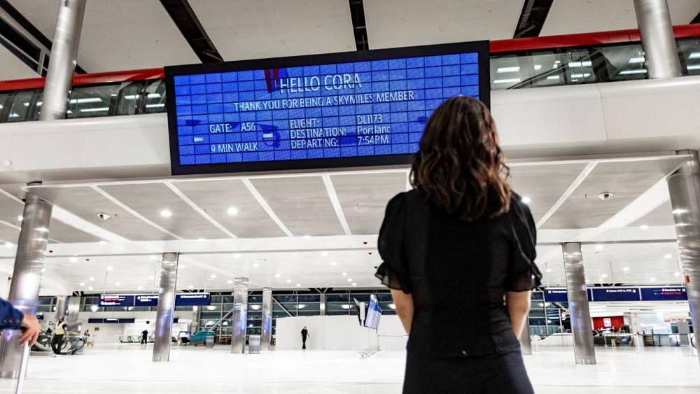 Creepy or cool? This airport flight board displays personalised info