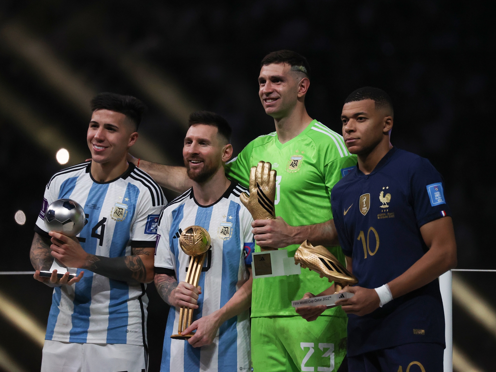 Lionel Messi Emiliano Martinez Kylian Mbappe hoisting the award | Argentina v France, FIFA World Cup 2022 Final, December 18, Lusail Stadium