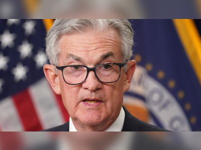 US central bank slows pace of rate hikes again but warns of more action ahead