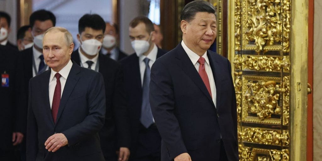 Putin hits back at claims by 'jealous people' that Russia is becoming dependent on China, days after meeting with Xi Jinping
