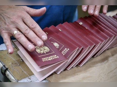 Russian officials having passports seized due to flight concerns